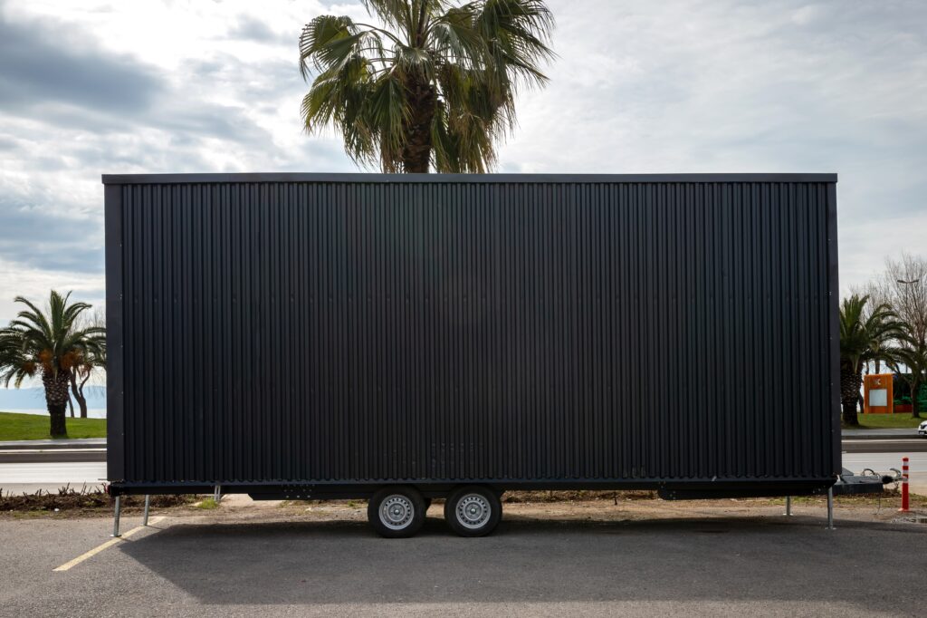 modern,tiny,house,on,wheels,with,wooden,exterior.